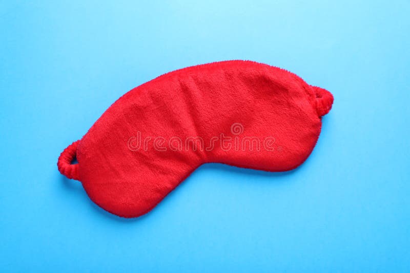 Soft Sleep Mask on Light Blue Background, Top View Stock Image Image