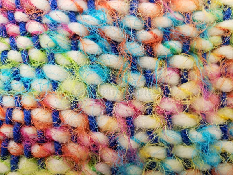 Vibrant and Textured Close-up of Multicolored Yarn stock photo