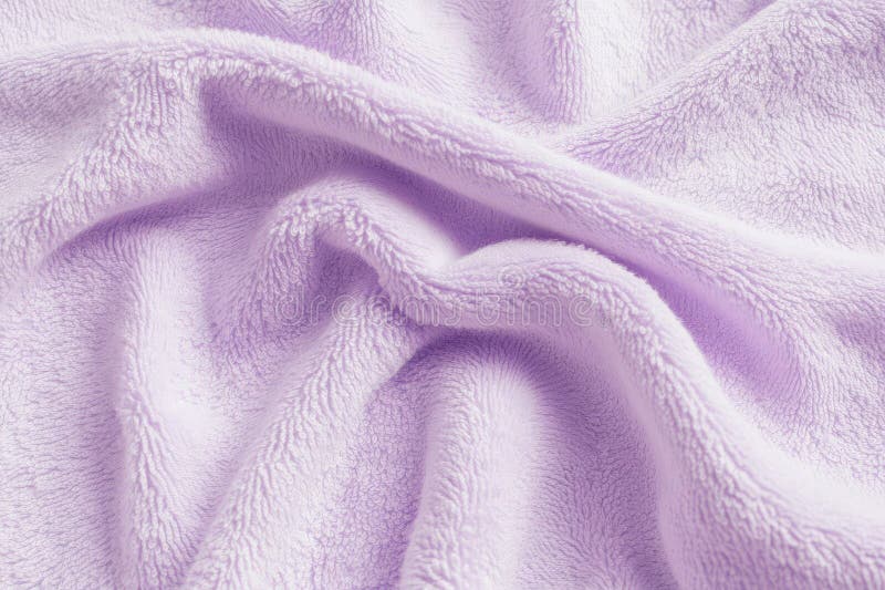 A soft terry cloth fabric texture background in pastel lavender. The plush, absorbent loops create a royalty free stock photography