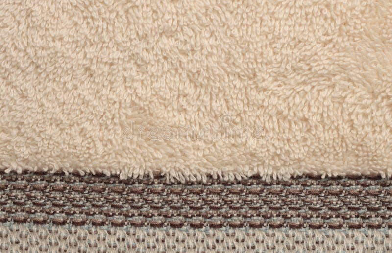 Soft Terry fabric towel copy space background. Beige color royalty free stock photo