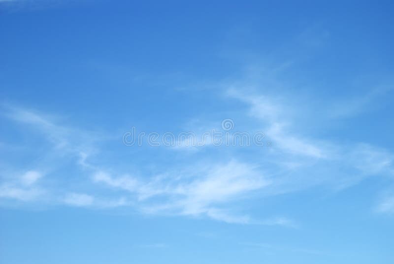 Soft white clouds against blue sky