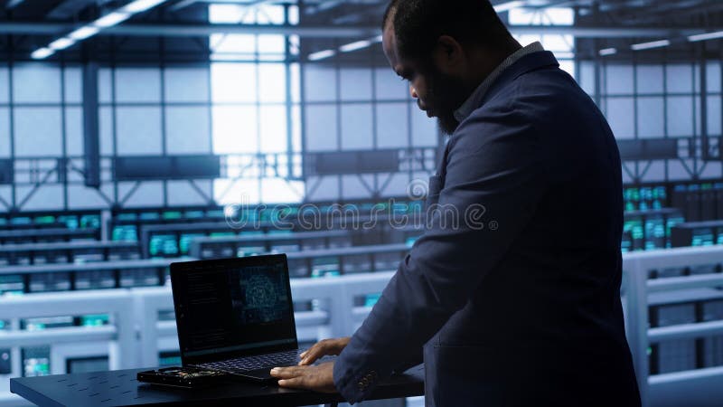 Software developer in data center using artificial intelligence stock photo