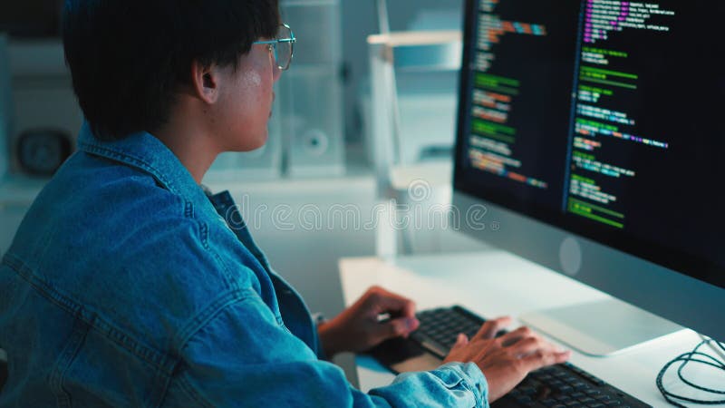 Software developer focused on debugging code multi screen programming task system development project programmer debugging