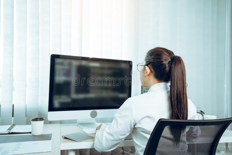 Software developers are analyzing about the code written into the program on the computer in office room royalty free stock images
