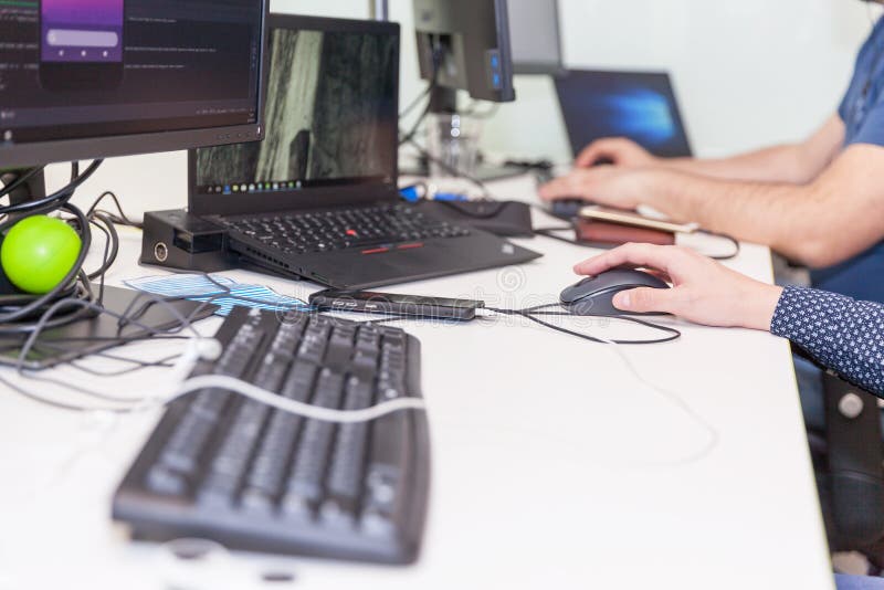 Software developers working on computer in IT office. Program coding working stock images, royalty-free photos and pictures