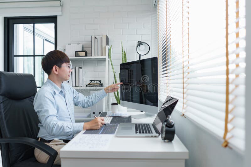 Software Development Concept, Male Programmer Checking Data Codes on