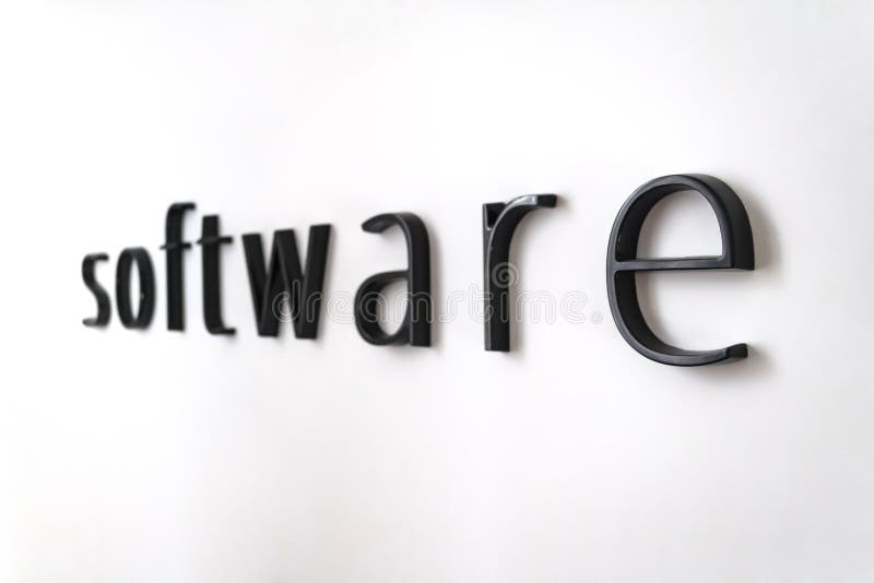 Software Word on White Painted Wall with Blurred Background Stock Photo Image of mark, wall
