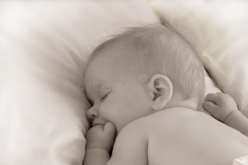 Sogni dolci di un bambino immagine stock Sogni dolci di un bambino immagine stock