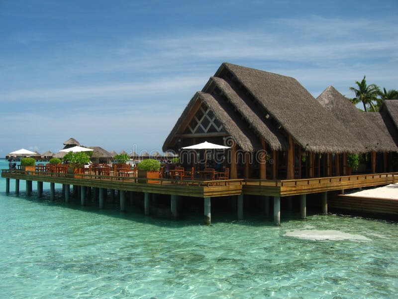 Sogno della Camera di spiaggia nei Maldives fotografia stock Sogno della Camera di spiaggia nei Maldives fotografia stock