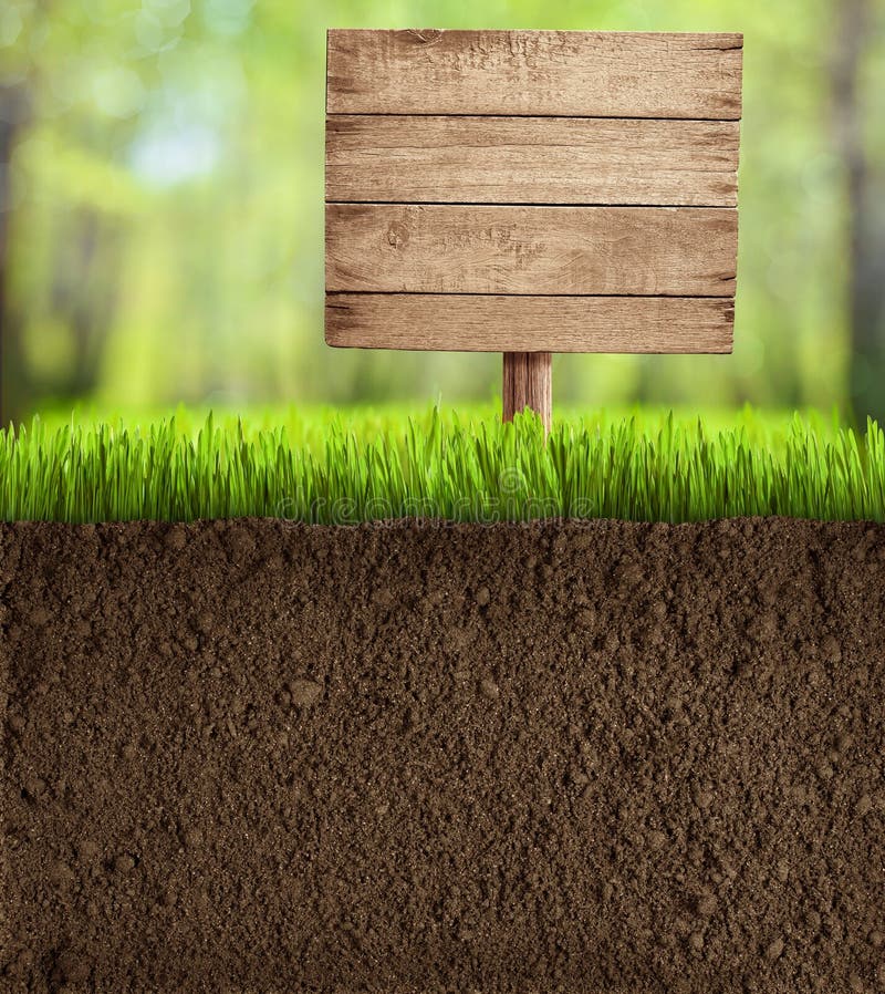 Soil Cut in Garden with Wooden Sign Stock Photo - Image of sign, blank:  34346474