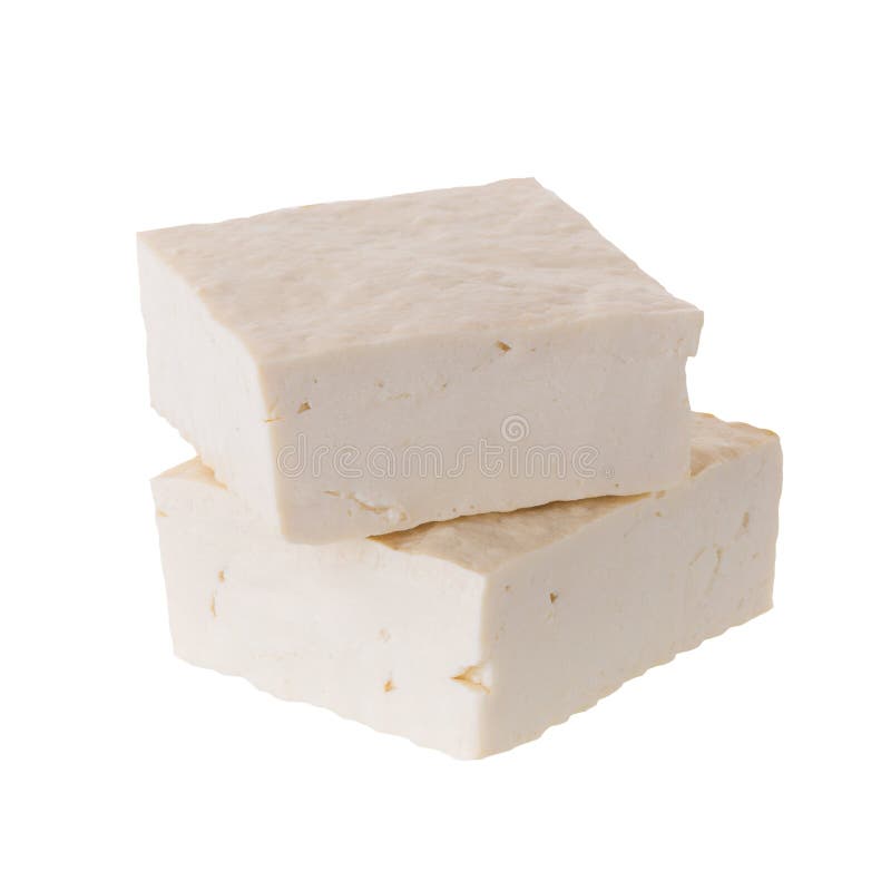 sojabönaosttofu som tärnas som isoleras på vit bakgrund arkivbild sojabönaosttofu som tärnas som isoleras på vit bakgrund arkivbild