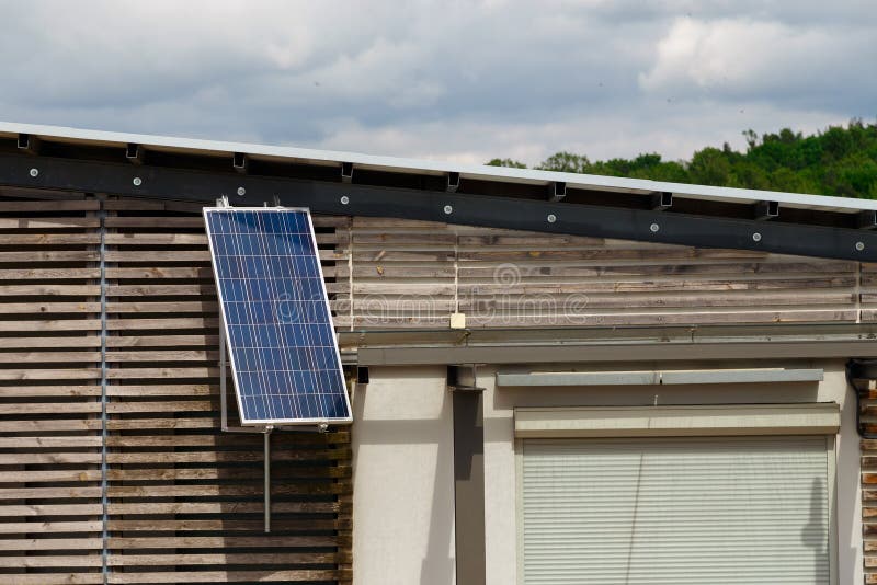 Solar battery on the house stock photo. Image of battery 103641752