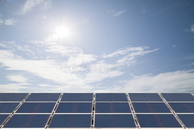 Solar Cell Panel on Cloud Blue Sky , Energy Saving Concept Stock Image