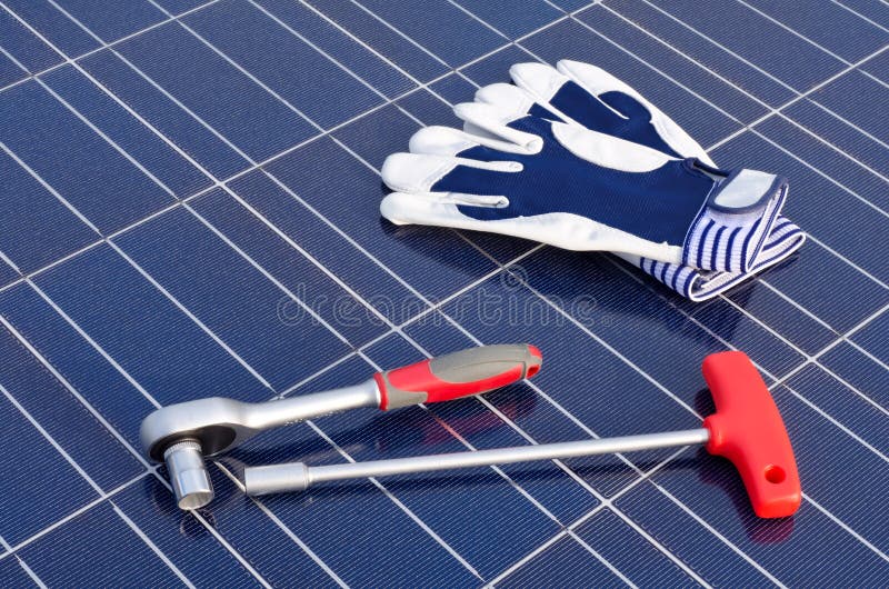 Solarzellen und-Werkzeuge und Handschuhe.
