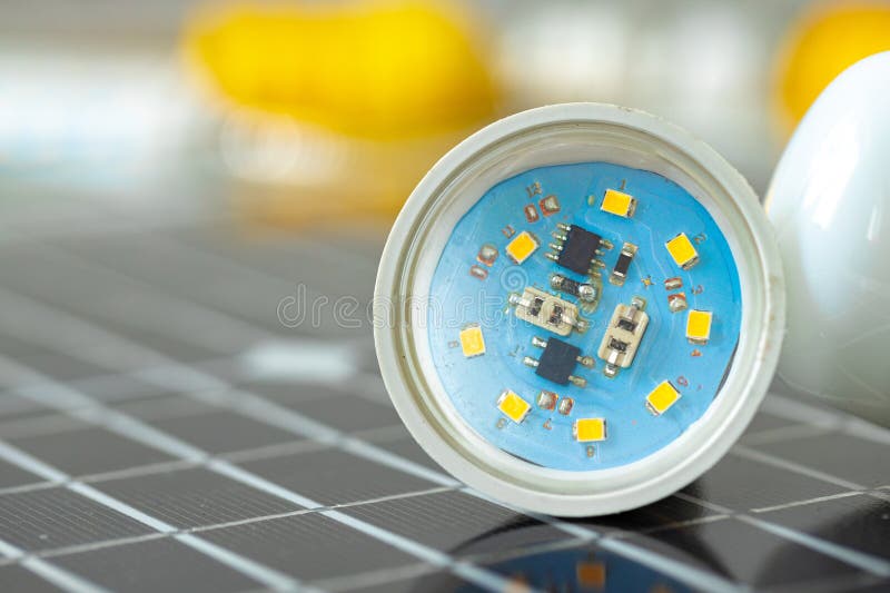 Solar Energy Panel and Light Bulb, Green Energy Concept Stock Image