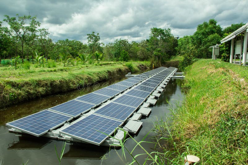 The Solar Farm for Green Energy in the Pond Stock Image Image of