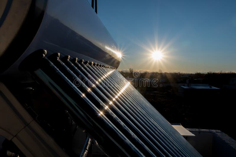 Solar hot water tank at sunset