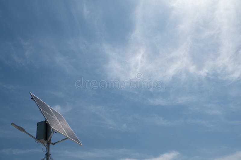 Solar Panel Against Blue Sky with Clouds. Solar Energy Panel Stock