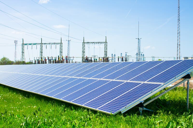Solar Panel Against High Voltage Towers Stock Image Image of