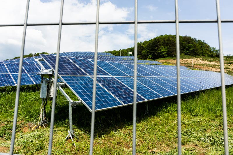 Solar Panel Farm with Fence Stock Image Image of sunshine