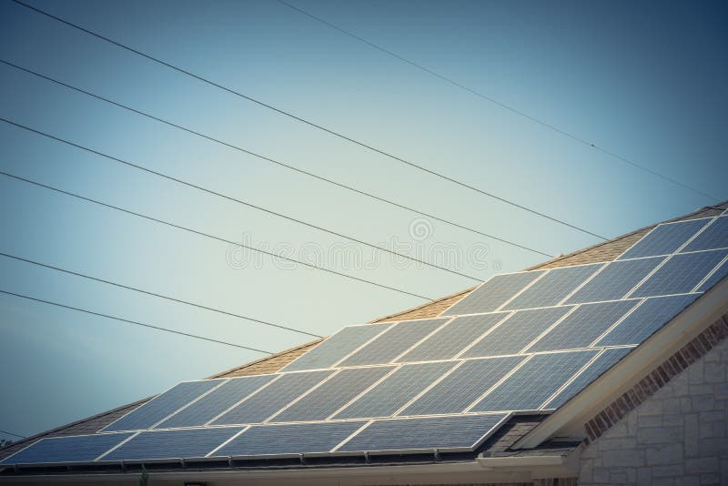 Solar Panel Installation on Asphalt Shingles Rooftop Stock Image