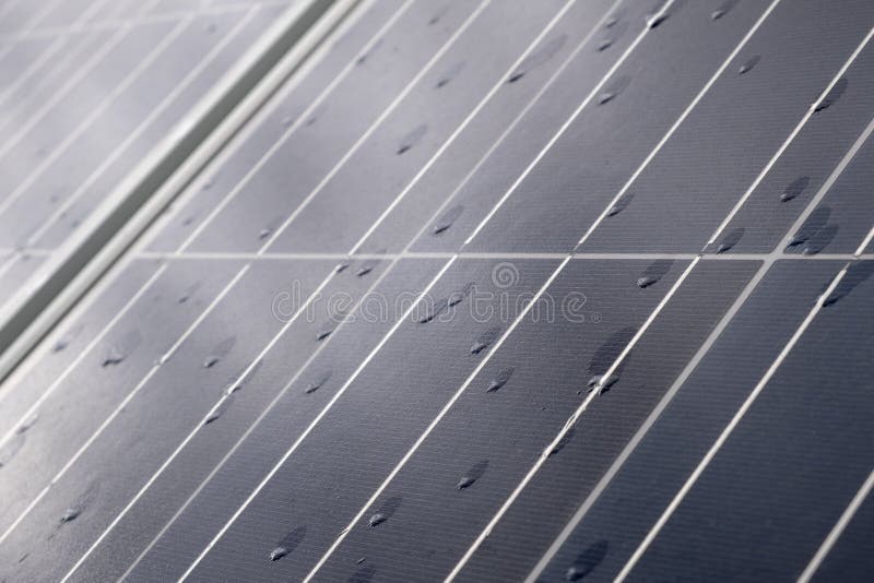 Solar Panel with Rain Drops on it. Solar Panel in Rain Stock Photo