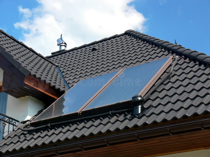 Solar panels on black roof royalty free stock photos