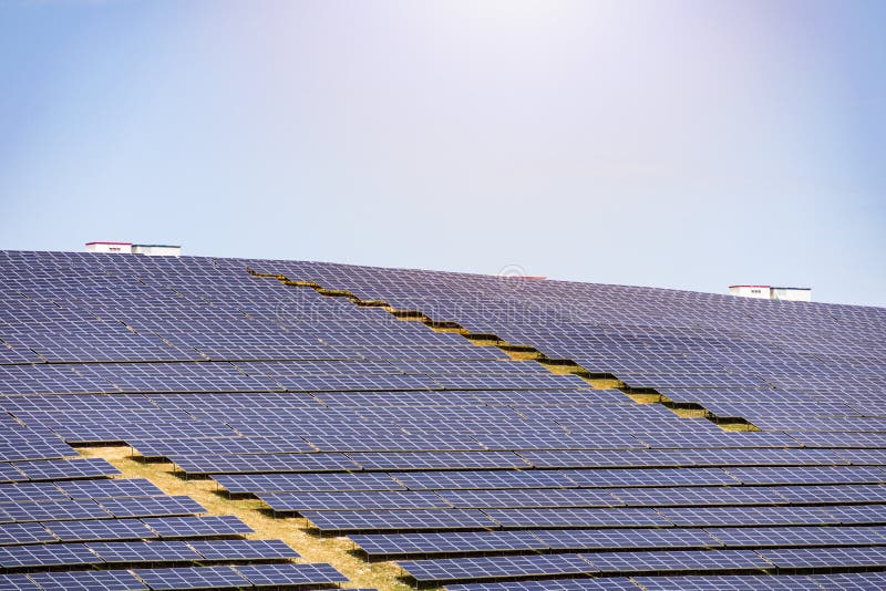 Solar Panels Installed To Generate Electricity on Land Stock Photo