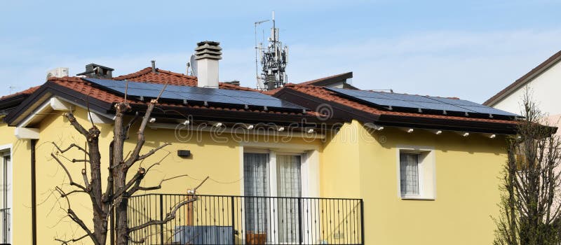 Solar Panels for renewable electrical energy production on the roofs royalty free stock photography