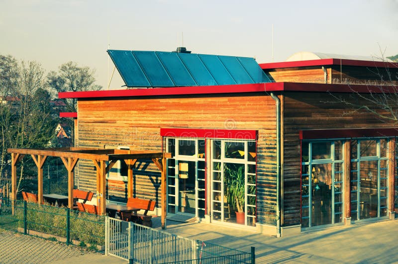 Solar panels on a roof of a modern building