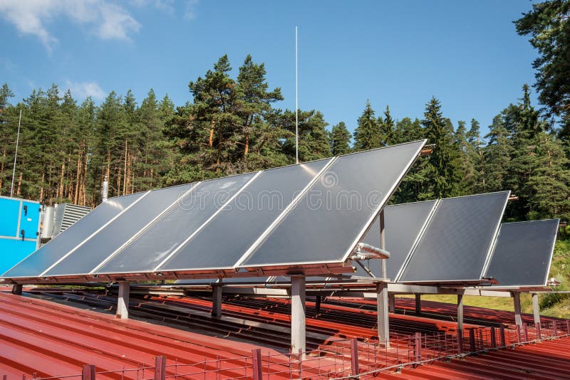 Solar panels on a roof stock photo
