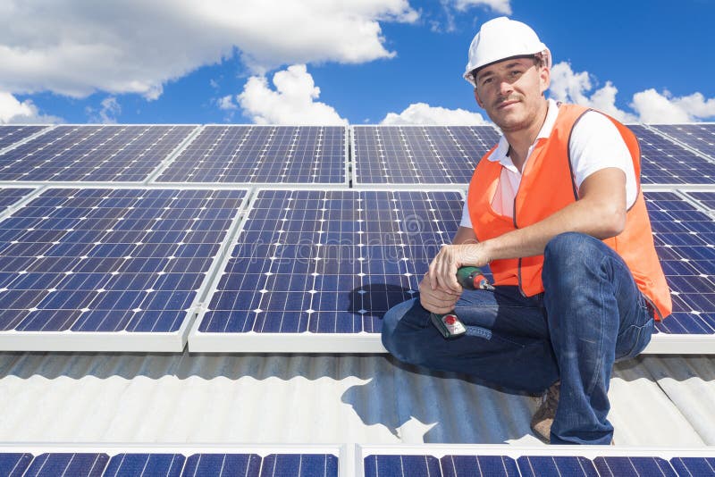 Solar panels with technician stock photos