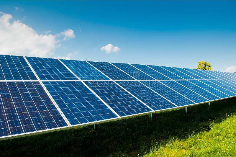 Solar power panels on blue sky and copy space stock photos