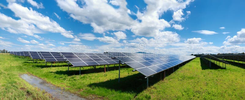 Solar Power Plant in Autumn. Solar Panels on Orange Grass Field Under Blue Sky with Clouds Stock Photo - Image of green, renewable: 212674024