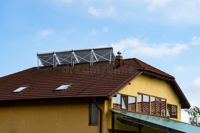 Solar Water Heater on Roof Top. Solar Panel for Hot Water, System on