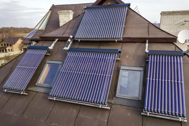 Solar water heating system on house roof. Hot water boiler, alternative ecological sun energy generator stock images Solar water heating system on house roof. Hot water boiler, alternative ecological sun energy generator stock images