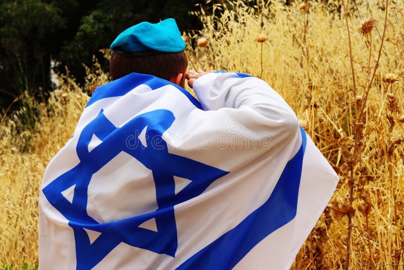 Soldier Israel with a Flag of Israel. Soldier salutes, Patriot of Jewish State. Image for Israel Memorial Day, Holocaust Remembrance Day, Israel Independence Day. Israeli Soldier, IDF. Soldier Israel with a Flag of Israel. Soldier salutes, Patriot of Jewish State. Image for Israel Memorial Day, Holocaust Remembrance Day, Israel Independence Day. Israeli Soldier, IDF