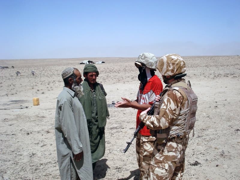 Soldier together with his translator trying to bring peace in Afghanistan. Soldier together with his translator trying to bring peace in Afghanistan.