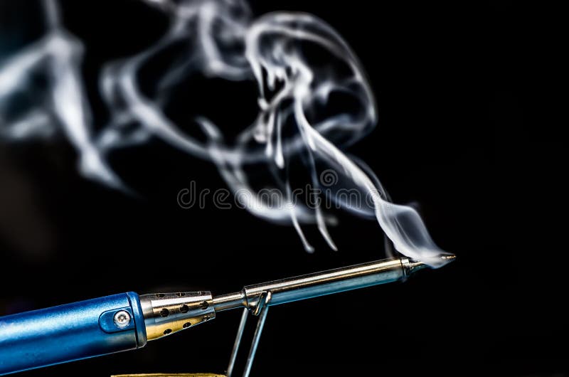 Soldering Iron with Smoke on a Black Background. Electrical Stock Image Image of wire