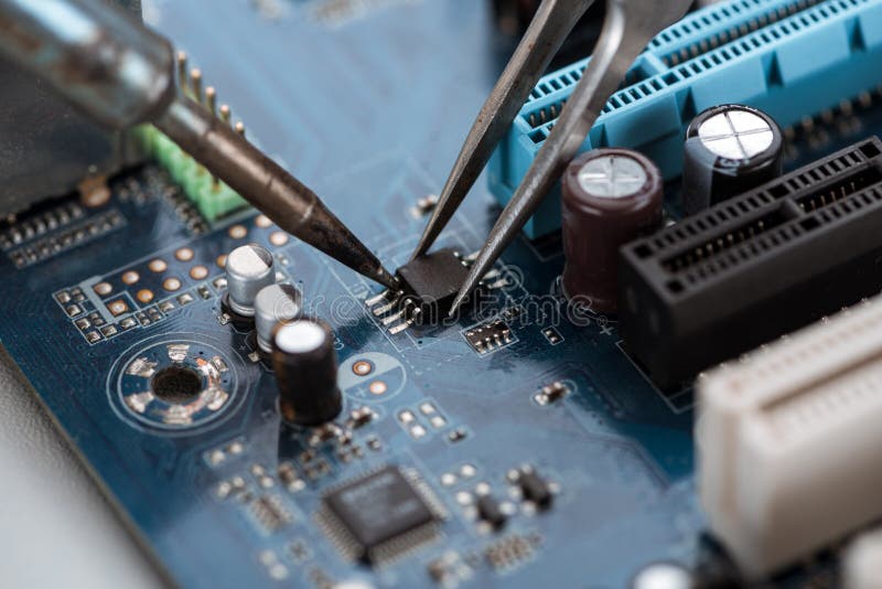 Soldering typical desktop computer baseboard royalty free stock images
