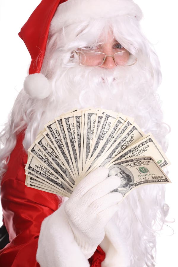 Soldi della holding del Babbo Natale. fotografia stock libera da diritti Soldi della holding del Babbo Natale. fotografia stock libera da diritti