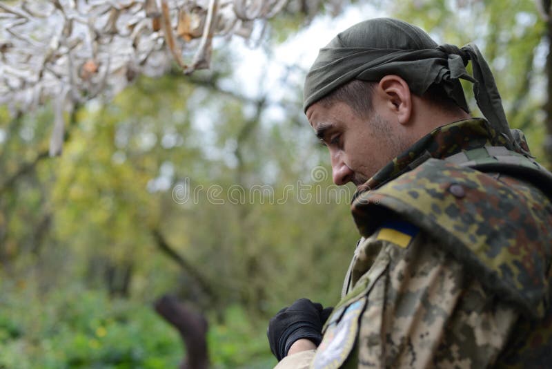 A Soldier of the Ukrainian Army. Bandana on His Head. Back. Fore Editorial  Photography - Image of forest, donbas: 79857247