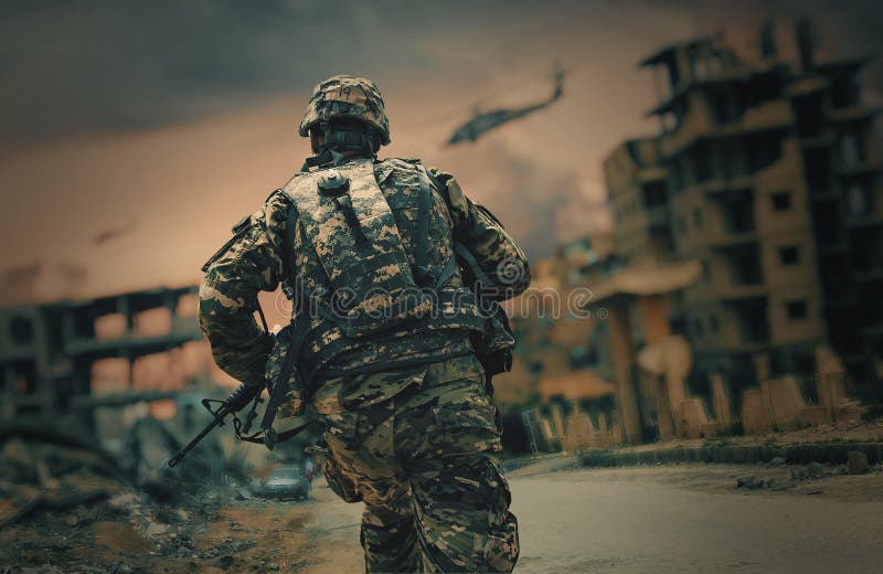 Soldier running in destroyed city stock image Soldier running in destroyed city stock image