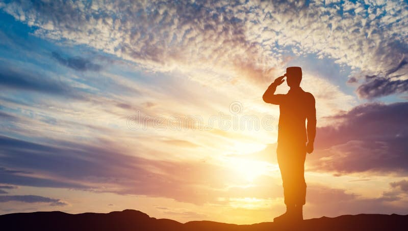 Soldier saluting at sunset. Army, salute, patriotic concept