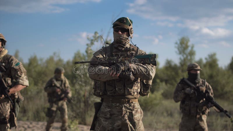 Soldiers standing on field