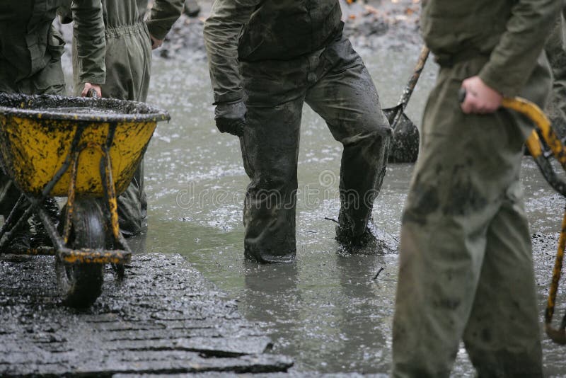 Soldiers Working in the Mud Stock Image Image of wheelbarrows, pool