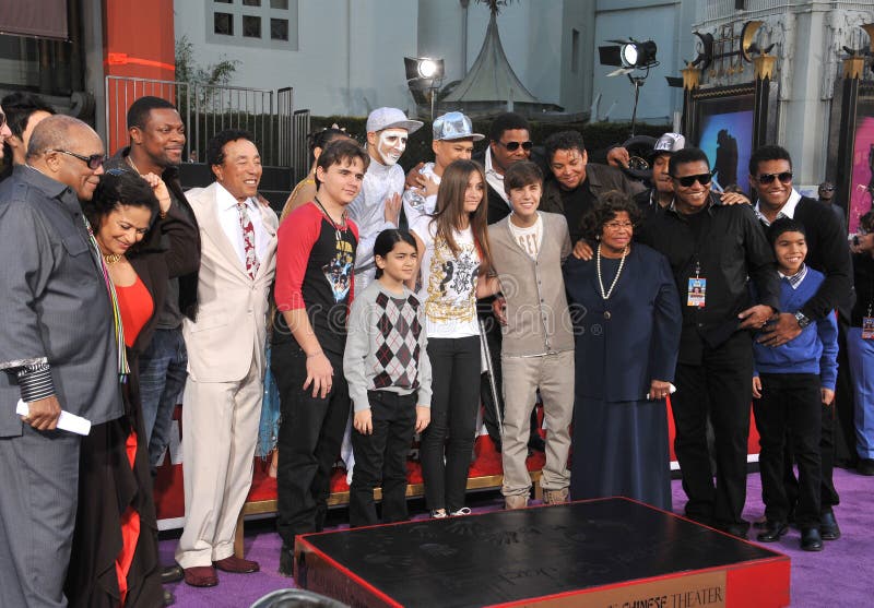 Michael Jackson's children Prince Michael, Paris & Prince Michael II Blanket with their grandmother Katherine Jackson & singer Justin Bieber, Smikey Robinson, Quincy Jones & Tito Jackson on Hollywood Boulevard where they placed their father's hand & footprints, using his shoes & glove, in cement in the courtyard of the Grauman's Chinese Theatre. Cirque du Soleil's new show Michael Jackson THE I. Michael Jackson's children Prince Michael, Paris & Prince Michael II Blanket with their grandmother Katherine Jackson & singer Justin Bieber, Smikey Robinson, Quincy Jones & Tito Jackson on Hollywood Boulevard where they placed their father's hand & footprints, using his shoes & glove, in cement in the courtyard of the Grauman's Chinese Theatre. Cirque du Soleil's new show Michael Jackson THE I