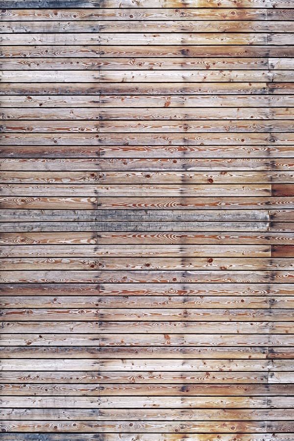 A Solid Wall of Aged Brown Wooden Planks with Hammered Nails Located ...