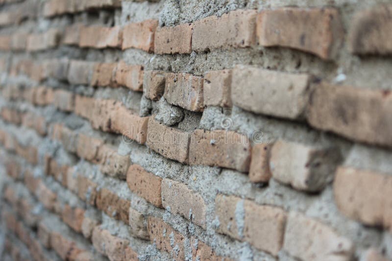 Solidne i piękne mury ceglane nadają się do pleców i klasycznych domów, takich jak starożytne królewskie zamki fotografia stock