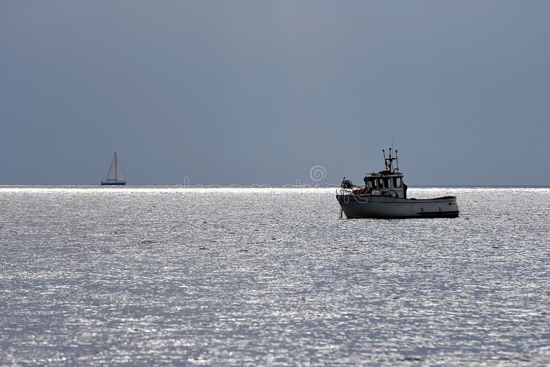 Solig eftermiddag i havet royaltyfri foto Solig eftermiddag i havet royaltyfri foto